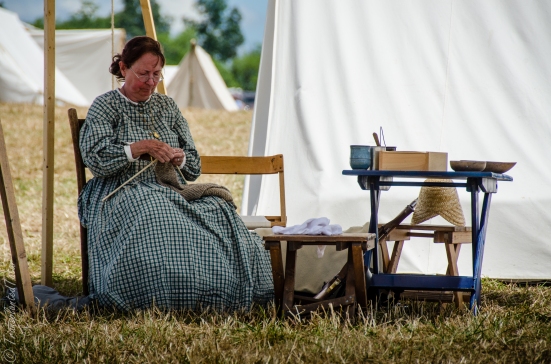 Female reenactor knitting, Reenactor encampment, 150th Anniversary Gettysburg Battle Reenactment